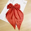 French vintage large satin bow hair clip with long ribbons in caramel orange color - Red
