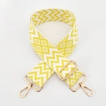 Detail of adjustable 5cm wave pattern bag strap with gold metal rotating hooks - Yellow
