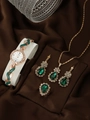 Luxury gold women's watch set with green gemstones, matching necklace and ring - Green Zirconia Set