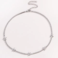 Macro detail of silver flower necklace with micro-pave zircons and spring clasp - Platinum White Zirconia