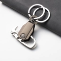 Premium Gunmetal Schlüsselanhänger mit Handyhalter-Funktion auf Lederhintergrund - GX-488 Mit Messer (Waffengrau)
