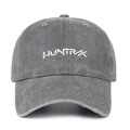 Close-up of a grey washed cotton baseball cap with white HUNTR/X embroidery details - Gray