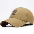 Classic khaki cotton baseball cap with premium brown leather brand patch on front - Beige