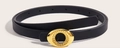 Dettaglio di una sottile cintura in pelle nera con fibbia ovale dorata e testurizzata - 1394 Fibbia Ovale - Nero