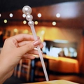Detailed view of hand-held hair stick with three white faux pearls and acetate resin body - S258-1# Pearl 19cm Acetate Hair Stick (White Pearlescent)