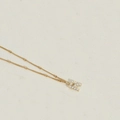 Elegant gold letter R pendant necklace with mini pearls on a delicate beaded chain - Letter R