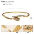 Golden snake-shaped open bracelet with sparkling zircons and green gemstone eyes - Snake Green Eye (BS-J5521G) / Gold