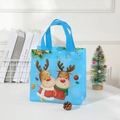 Detail of blue non-woven Christmas gift bag with cartoon reindeer and festive decorations - 23x22x11cm / Light Blue