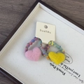 Dettagli di elastici per capelli in feltro di lana con cuori e fasce intrecciate - Elastico per capelli / Elastici Cuore Giallo e Rosa