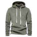 Detailed close-up of olive green polar fleece hoodie featuring adjustable drawstring hem - S / Olive Green