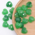 Green faceted heart-shaped crystal beads for DIY jewelry making in a wooden bowl - Single Piece / Synthetic Green Jade