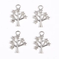 Close-up of four silver tree pendants with inlaid crystals for DIY jewelry making - Silver Tree