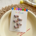 Set of 5 heart-shaped hair clips with beige plaid fabric pattern on display card - Khaki