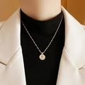 Baroque style gold pearl necklace with detailed rose embossed circular pendant - Rose Necklace Light Luxury Sweater Chain