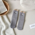 Gray coral fleece socks with cute cartoon monster ears in a cozy home setting - One Size / Gray