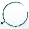 Macro view of emerald green heart-shaped cubic zirconia necklace with silver setting - Silver Green Zirconia Necklace