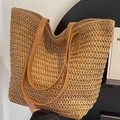 Large woven straw tote bag with brown leather handles and zipper closure for beach use - Khaki