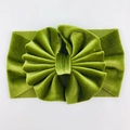 Detail of grass green velvet baby headband featuring a large multilayered ruffled flower - No. 16 Army Green