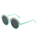 Cute mint green round frame children's sunglasses with colorful rainbow stripe accents - Green