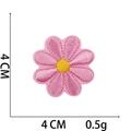 Detail of pink flower embroidery patch with yellow center and stitching 4cm x 4cm - No.9-Pink Daisy