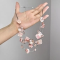 Multilayer necklace with irregular pink stones and silver beads on a neutral background - Pink Shell Multi-Layer Necklace Z-912