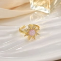 Adjustable golden sunflower ring with pink center stone and zircon petals on porcelain tray - JZ0101-Gold Pink Opal Sunflower
