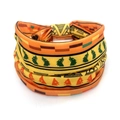 Elastic headband with orange African geometric patterns and tribal silhouettes for women - Style 2