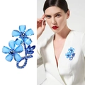 Macro detail of blue crystal rose brooch with rhinestones on white suit jacket - XD822089-1 Sky Blue Double Flower