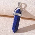 Close-up of a blue natural stone hexagonal column pendant with silver metal clasp - Lapis Lazuli