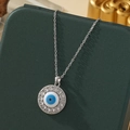 Collier en acier inoxydable argenté avec pendentif œil bleu et cristaux brillants - A27-argent