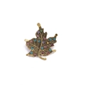 Macro shot of maple leaf brooch with colorful rhinestones on vintage bronze metal - Maple Leaf