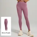 Leggings de sport à taille haute de couleur Berry Purple en tissu extensible - S / Violette de Baies