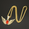 Macro view of gold angel wing pendant with ruby gemstone and sparkling diamond accents - Gold Pendant + 60CM Twist Chain
