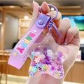 Star-shaped liquid keychain with purple silicone strap and colorful floating beads - Fresh Star - Purple
