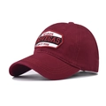 Close-up of vintage Las Vegas embroidery on a premium burgundy cotton baseball cap - Adjustable / Burgundy