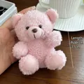Detail view of a 11cm pink plush teddy bear charm with soft curly lamb fleece texture - Pink