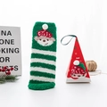 Green and white striped Christmas coral fleece socks in a red festive gift box - Red Box Green Striped Bear