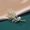 Elegant gold leaf brooch with micro-pave crystals and white pearl detail - Golden Leaf Crystal Pearl
