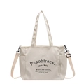 Bolso tote grande de lona beige con correa ajustable e impresión tipográfica negra - Blanco Roto