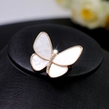 Elegant gold butterfly brooch featuring pearl wings and sparkling crystal details - Shell Layered Butterfly