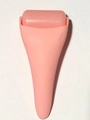 Pink handheld ice roller massager made of durable plastic for facial cooling therapy - Solid Pink
