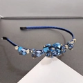 Elegant dark blue crystal headband with hand-threaded rhinestones on a satin-wrapped band - Royal Blue
