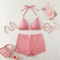 Flachbild von pinkfarbenem Gingham-Bikini mit Schleifendetails auf weichem Plüschhintergrund - S / Rot