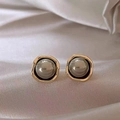 Elegant gold geometric earrings featuring a lustrous grey pearl on white silk fabric - Geometric Grey Pearl Studs - A1412 Gold