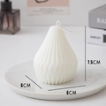 White geometric pear-shaped scented candle with origami texture on a display plate - Pear Spiral White (Tuberose)