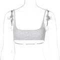 Detailed view of grey ribbed knit crop top with thin straps and textured fabric surface - S / Gray