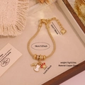 Bracelet tulipe papillon doré avec breloques chat, arête de poisson et patte de chat - 3# Style de patte de chat et d'arête de poisson mignon