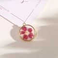 Round golden resin pendant with magenta dried flower and sparkles for DIY jewelry - Style 5