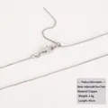 Detailed macro view of a 45cm silver box chain with lobster clasp and sliding bead - Silver Adjustable Box Chain