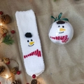 Plush white coral fleece Christmas socks with snowman design in a festive gift ball - White Hat Snowman